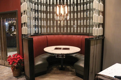 Maple Shade-NJ-detailed-view-of-circular-red-restaurant-booth-with-elongated-privacy-wall-surrounding-booth