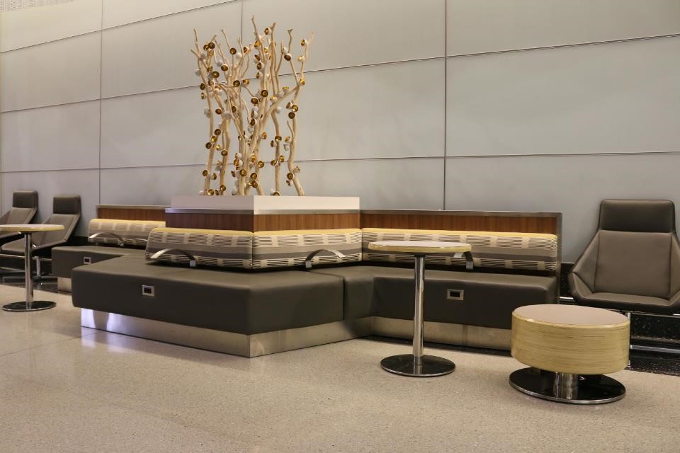 Newark-NJ-modern-sleek-corporate-lounge-area-with-long-gray-booth-placed-along-wall