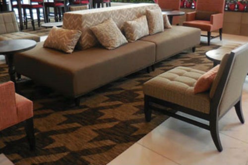 Tuscaloosa-AL-moody-lounge-area-with-wraparound-sofa-and-lounge-chairswrap